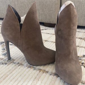 Never worn Nine West booties.